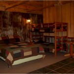 Myers Motel MYERS MOTEL. 2 rooms with 1 queen bed, 1 bunk bed, 1 queen sleeper sofa, bath, kitchenette & living area in each.